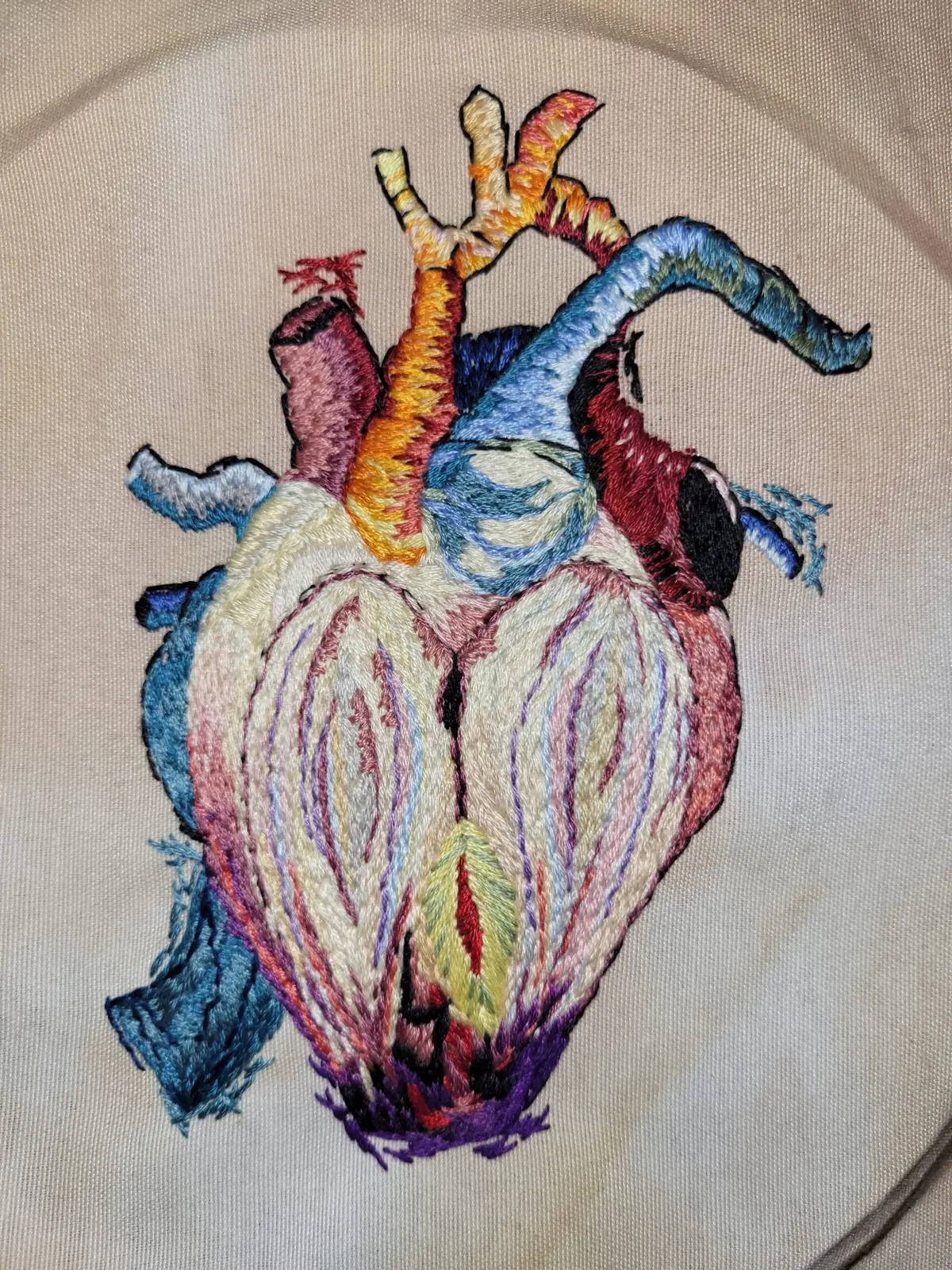 Hand-stitched arpillera textile artwork by Barbara Schreiner